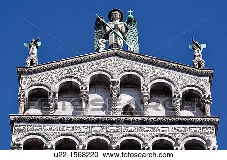 Lucca (Italy): detail of San Michele in Foro Church fa? ade, with Archangel Michele statue View Large Photo Image Stock Image - Lucca (Italy): detail of San Michele in Foro Church fa? ade, with Archangel Michele statue. Fotosearch