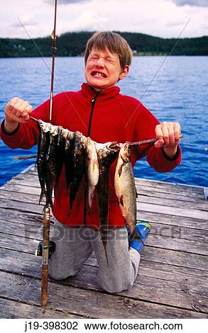 Stock Image - Luck of fishing. Sweden. Fotosearch