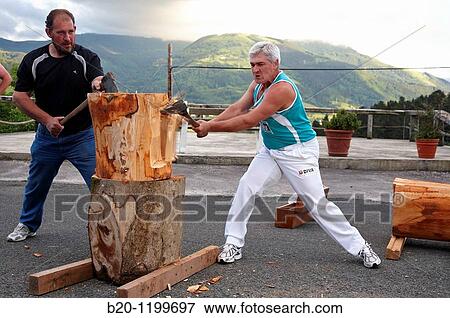 Luis Txapartegi, Aizkolari (wood-chopping), and Iaki Perurena, Basque rural sport, Aduna, Gipuzkoa, Basque Country, Spain View Large Photo Image Stock Photo - Luis Txapartegi, Aizkolari (wood-chopping), and Iaki Perurena, Basque rural sport, Aduna, Gipuzkoa, Basque Country, Spain. Fotosearch