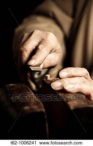 Luthier workshop Manufacturing stringed musical instruments Handicraft View Large Photo Image Stock Image - Luthier workshop Manufacturing stringed musical instruments Handicraft. Fotosearch