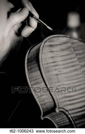 Luthier workshop Manufacturing stringed musical instruments Handicraft View Large Photo Image Stock Image - Luthier workshop Manufacturing stringed musical instruments Handicraft. Fotosearch