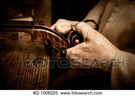 Luthier workshop Manufacturing stringed musical instruments Handicraft View Large Photo Image Stock Photography - Luthier workshop Manufacturing stringed musical instruments Handicraft. Fotosearch