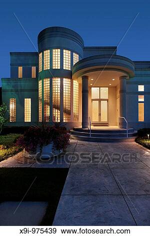 Luxury home at dusk with column entry View Large Photo Image Stock Photo - Luxury home at dusk with column entry. Fotosearch