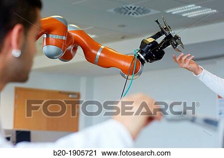 Stock Image - LWR robot, using haptic teleoperation with force feedback Safety in human-robot cooperation Industry, Tecnalia Research & innovation, Technology and Research Centre, Miramon Technological Park, San Sebastian, Donostia, Gipuzkoa, Basque Country, Spain. Fotosearch