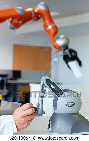 Stock Photo - LWR robot, using haptic teleoperation with force feedback Safety in human-robot cooperation Industry, Tecnalia Research & innovation, Technology and Research Centre, Miramon Technological Park, San Sebastian, Donostia, Gipuzkoa, Basque Country, Spain. Fotosearch