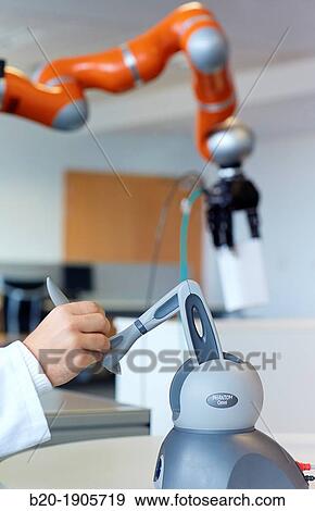 Stock Photo - LWR robot, using haptic teleoperation with force feedback Safety in human-robot cooperation Industry, Tecnalia Research & innovation, Technology and Research Centre, Miramon Technological Park, San Sebastian, Donostia, Gipuzkoa, Basque Country, Spain. Fotosearch