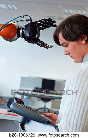 LWR robot, using haptic teleoperation with force feedback Safety in human-robot cooperation Industry, Tecnalia Research & innovation, Technology and Research Centre, Miramon Technological Park, San Sebastian, Donostia, Gipuzkoa, Basque Country, Spain View Large Photo Image Stock Photography - LWR robot, using haptic teleoperation with force feedback Safety in human-robot cooperation Industry, Tecnalia Research & innovation, Technology and Research Centre, Miramon Technological Park, San Sebastian, Donostia, Gipuzkoa, Basque Country, Spain. Fotosearch