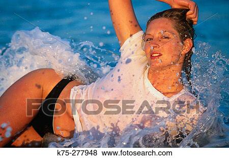 lying in the surf View Large Photo Image Stock Photo - lying in the surf. Fotosearch