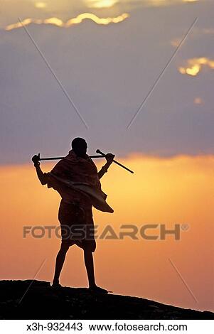 Maasai herdsman in the bush at sunset, Kenya, East Africa View Large Photo Image Stock Image - Maasai herdsman in the bush at sunset, Kenya, East Africa. Fotosearch