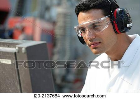 Picture - Machine for cutting material by water jet and abrasive. Industry. Technology and Research Centre. Technological Park, San Sebastian, Donostia, Gipuzkoa, Basque Country, Spain. Fotosearch