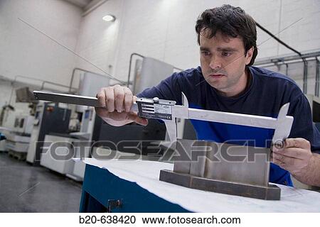 Machining workshop, measurement control. Loiu, Biscay, Euskadi, Spain View Large Photo Image Stock Image - Machining workshop, measurement control. Loiu, Biscay, Euskadi, Spain. Fotosearch