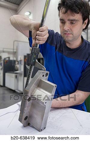 Stock Photo - Machining workshop, measurement control. Loiu, Biscay, Euskadi, Spain. Fotosearch