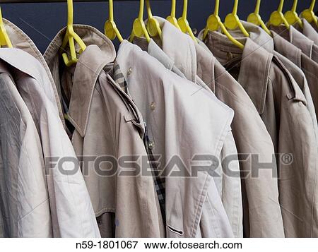 Macintosh rain coats View Large Photo Image Stock Photo - Macintosh rain coats. Fotosearch