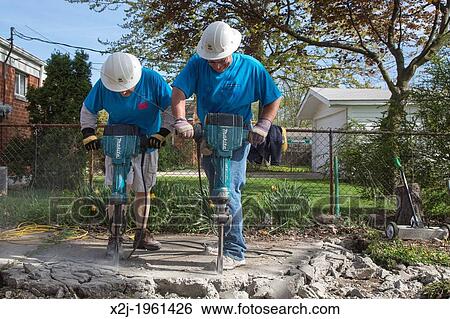 Stock Images Of Madison Heights Michigan Volunteers From Mercedes Madison Heights Michigan Volunteers From Mercedes Benz Financial Services Help Re Habilitate A Habitat For Humanity House Low Income Family