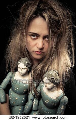 Madness. Woman and two old dolls. View Large Photo Image Stock Image - Madness. Woman and two old dolls.. Fotosearch