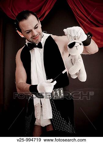 Stock Photo - Mago actuando en el circo. Fotosearch