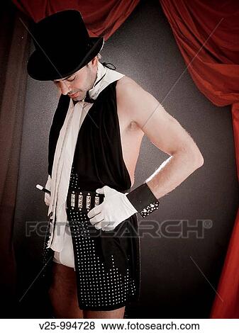 Stock Photo - Mago actuando en el circo. Fotosearch