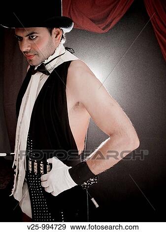 Stock Photo - Mago actuando en el circo. Fotosearch