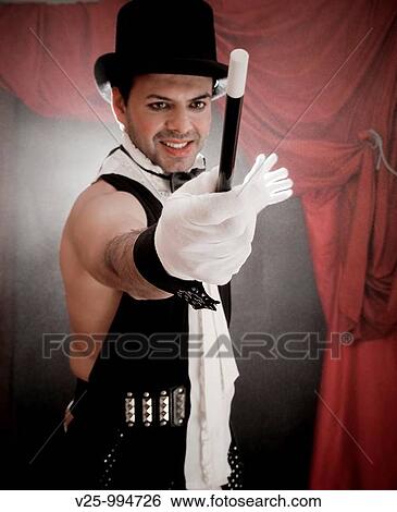Stock Photograph - Mago actuando en el circo. Fotosearch