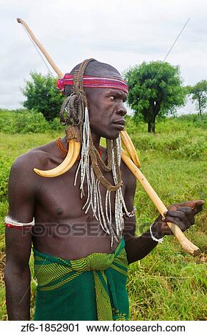 Stock Image - Mago National Park Ethiopia Africa Mursi tribe man Lower Omo Valley tradition tribal wild pottery 15. Fotosearch
