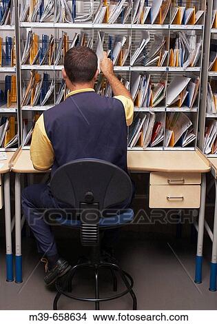 Mailroom sorting. Spain. View Large Photo Image Picture - Mailroom sorting. Spain.. Fotosearch