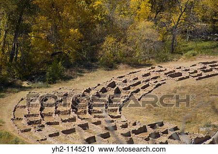 Main Loop trail showing the archeology features along Frijoles Canyon at Bandelier National Monument in New Mexico Tyuonyi Pueblo walls View Large Photo Image Stock Image - Main Loop trail showing the archeology features along Frijoles Canyon at Bandelier National Monument in New Mexico Tyuonyi Pueblo walls. Fotosearch