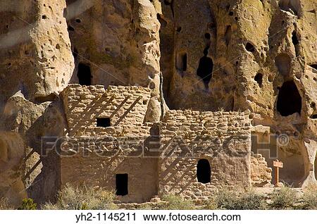 Stock Image - Main Loop trail showing the archeology features along Frijoles Canyon at Bandelier National Monument in New Mexico Talus House. Fotosearch