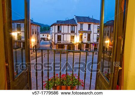 Main Square at night time, viewed from an open window. Covarrubias, Burgos province, Castilla Leon, Spain. View Large Photo Image Stock Photograph - Main Square at night time, viewed from an open window. Covarrubias, Burgos province, Castilla Leon, Spain.. Fotosearch