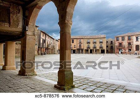Main Square of Medinaceli, Soria, Castilla y Leon, Spain Five thousand square meters of extension with notable buildings Under his soil they have found Roman mosaics View Large Photo Image Stock Photograph - Main Square of Medinaceli, Soria, Castilla y Leon, Spain Five thousand square meters of extension with notable buildings Under his soil they have found Roman mosaics. Fotosearch