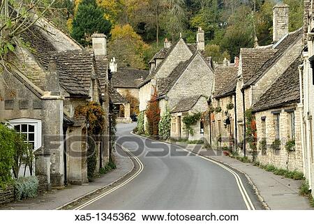 Main street thru village, Castle Combe, Cotswolds, England, UK View Large Photo Image Stock Image - Main street thru village, Castle Combe, Cotswolds, England, UK. Fotosearch