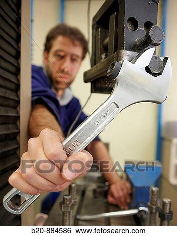 Stock Photograph - Maintenance, adjustable wrench, handtool, metallurgy. Fotosearch