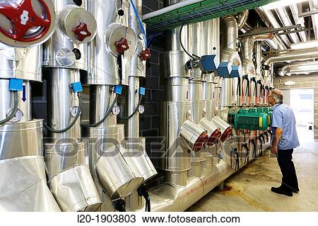 Stock Image - Maintenance Technician, Pumps ventilation and air conditioning, Onkologikoa Hospital, Oncology Institute, Case Center for prevention, diagnosis and treatment of cancer, Donostia, San Sebastian, Gipuzkoa, Basque Country, Spain. Fotosearch