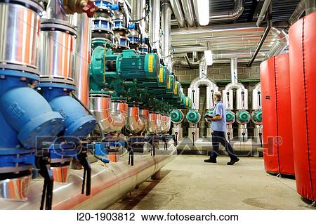 Stock Image - Maintenance Technician, Pumps ventilation and air conditioning, Onkologikoa Hospital, Oncology Institute, Case Center for prevention, diagnosis and treatment of cancer, Donostia, San Sebastian, Gipuzkoa, Basque Country, Spain. Fotosearch