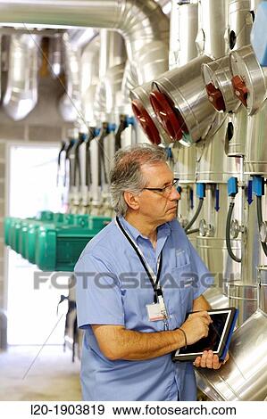 Maintenance Technician, Pumps ventilation and air conditioning, Onkologikoa Hospital, Oncology Institute, Case Center for prevention, diagnosis and treatment of cancer, Donostia, San Sebastian, Gipuzkoa, Basque Country, Spain View Large Photo Image Stock Photo - Maintenance Technician, Pumps ventilation and air conditioning, Onkologikoa Hospital, Oncology Institute, Case Center for prevention, diagnosis and treatment of cancer, Donostia, San Sebastian, Gipuzkoa, Basque Country, Spain. Fotosearch