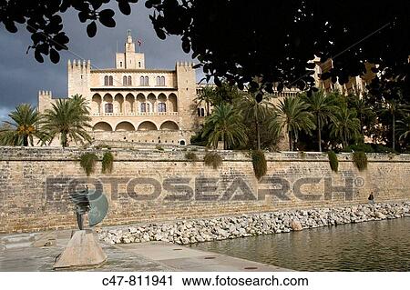 Majorca, Balearic Islands, Spain. The Palacio de la Almudaina was originally a citadel built by the Moorish governors just outside the city walls. View Large Photo Image Stock Image - Majorca, Balearic Islands, Spain. The Palacio de la Almudaina was originally a citadel built by the Moorish governors just outside the city walls.. Fotosearch