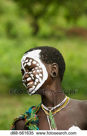Make-up. Surma child. Near Kibish. Ethiopia. View Large Photo Image Stock Photography - Make-up. Surma child. Near Kibish. Ethiopia.. Fotosearch