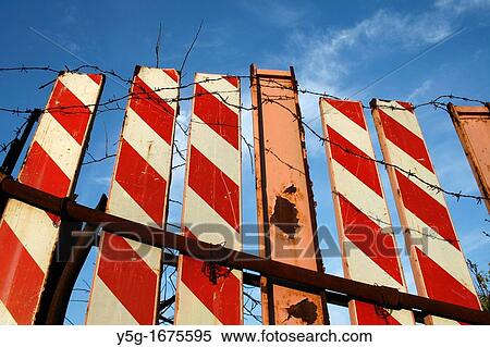 makeshift high fence with blue white stripes marks View Large Photo Image Stock Photography - makeshift high fence with blue white stripes marks. Fotosearch