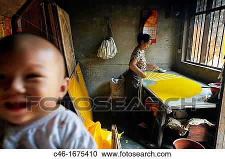 Making Folding fans, Fuli village, Li River, Guangxi, China. View Large Photo Image Stock Image - Making Folding fans, Fuli village, Li River, Guangxi, China.. Fotosearch