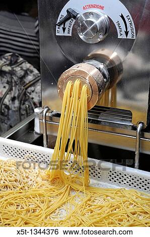 Stock Photograph - Making Fresh spaghetti. Fotosearch