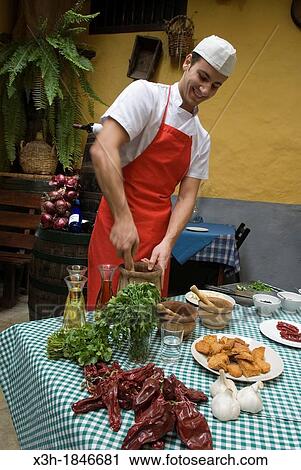 Stock Image - making of Mojo sauces demonstration, restaurant Sabor Canario, La Orotava, Tenerife, Canary Islands, Atlantic Ocean. Fotosearch