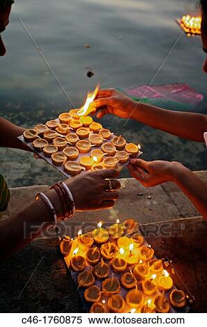 Making offerings? puja? to the lake Pichola during a holy day, Gangaur Ghat Udaipur Rajasthan India. View Large Photo Image Stock Photography - Making offerings? puja? to the lake Pichola during a holy day, Gangaur Ghat Udaipur Rajasthan India.. Fotosearch