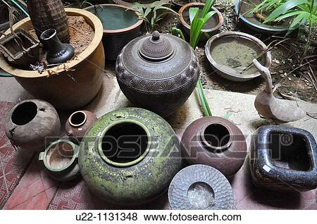 Stock Photo - Malacca (Malaysia): old pots sold at Malaqa House antique shop in Chinatown. Fotosearch