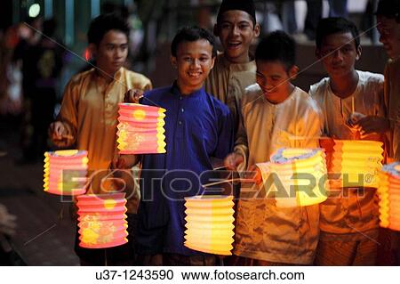 Malay teenagers were playing lanterns during Mooncake Festival. at Hockey Stadium, Kuching, Sarawak, Malaysia. View Large Photo Image Stock Image - Malay teenagers were playing lanterns during Mooncake Festival. at Hockey Stadium, Kuching, Sarawak, Malaysia.. Fotosearch