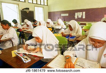 Malaysia Kuala Lumpur education Muslim school grade 10 in study classroom View Large Photo Image Stock Photo - Malaysia Kuala Lumpur education Muslim school grade 10 in study classroom. Fotosearch