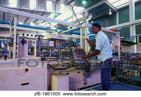 Stock Image - Malaysia Kuala Lumpur Modern Industry robot aided warehouse Carlsberg Brewery automated. Fotosearch
