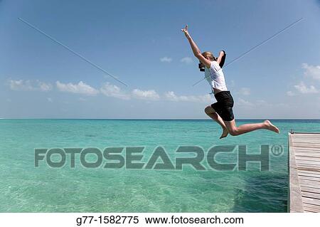 Maldives Islands Ari Atoll Business woman in sea. View Large Photo Image Stock Photography - Maldives Islands Ari Atoll Business woman in sea.. Fotosearch