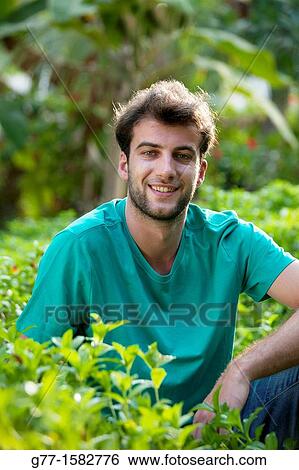 Maldives Islands Ari Atoll Man in grass. View Large Photo Image Stock Photograph - Maldives Islands Ari Atoll Man in grass.. Fotosearch