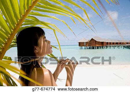 Maldives. South Male Atoll. Asian Woman. View Large Photo Image Picture - Maldives. South Male Atoll. Asian Woman.. Fotosearch