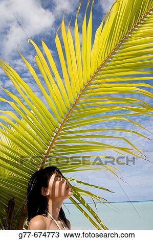 Stock Image - Maldives. South Male Atoll. Asian Woman.. Fotosearch