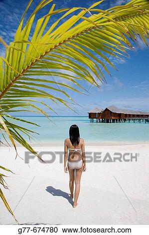 Maldives. South Male Atoll. Asian Woman. View Large Photo Image Stock Image - Maldives. South Male Atoll. Asian Woman.. Fotosearch